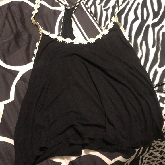 Wet Seal Other - I am selling a black shirt with sun flowers Wet Seal Other - I am selling a black shirt with sun flowers